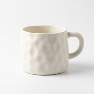 Artisanal Off-White Hammered Ceramic Mug with Organic Wavy Rim